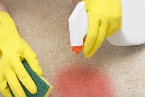 Professional oven cleaner in Finchley deep cleaning a kitchen oven