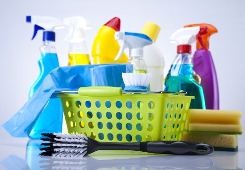 Finchley domestic cleaning service dusting a living room