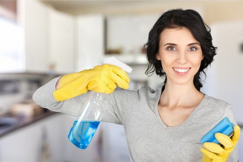 Professional cleaners preparing a room with detailed care